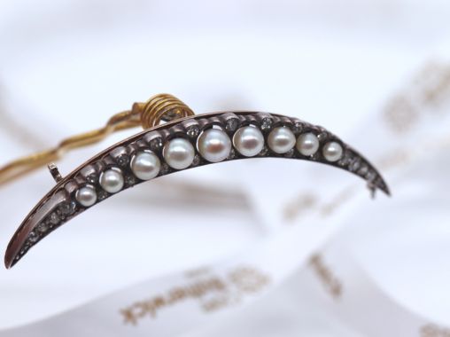 A Late 19th Century Pearl and Diamond En Tremblant Crescent Brooch and Hair Ornament